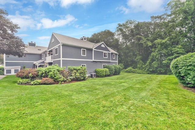 205 Windgate Cir Unit A, Monroe, CT 06468 - view of home's exterior featuring a lawn
