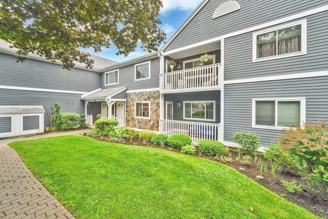 205 Windgate Cir Unit A, Monroe, CT 06468 - view of front of property with stone siding and a front yard