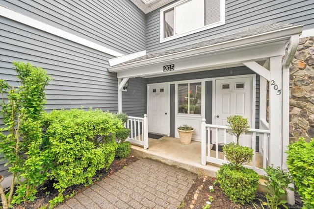 205 Windgate Cir Unit A, Monroe, CT 06468 - doorway to property featuring covered porch