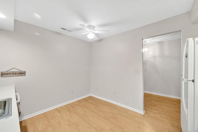 205 Windgate Cir Unit A, Monroe, CT 06468 - empty room with ceiling fan and light wood-type flooring