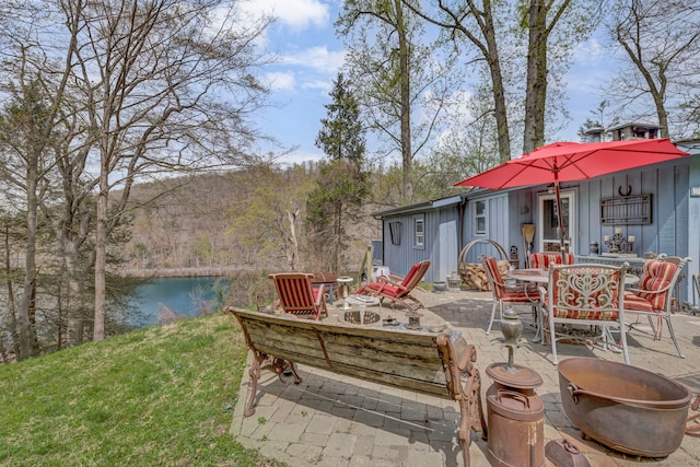25 Brookbridge Dr, Newtown, CT 06482 - view of patio with outdoor dining area and a water view