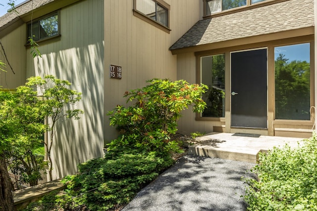 17 Crocus Ln Unit 17, Farmington, CT 06001 - doorway to property with a shingled roof