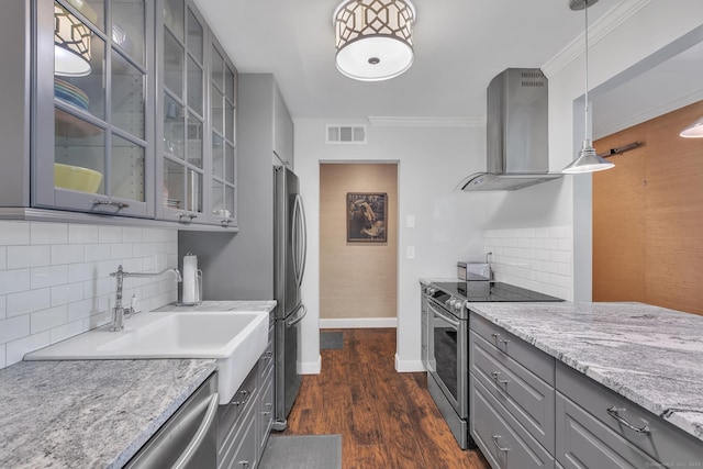 17 Crocus Ln Unit 17, Farmington, CT 06001 - kitchen with gray cabinets, stainless steel appliances, range hood, tasteful backsplash, and ornamental molding