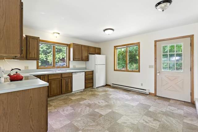 40 Alma Ave, Wolcott, CT 06716 - kitchen featuring a baseboard radiator, white appliances, plenty of natural light, and light countertops