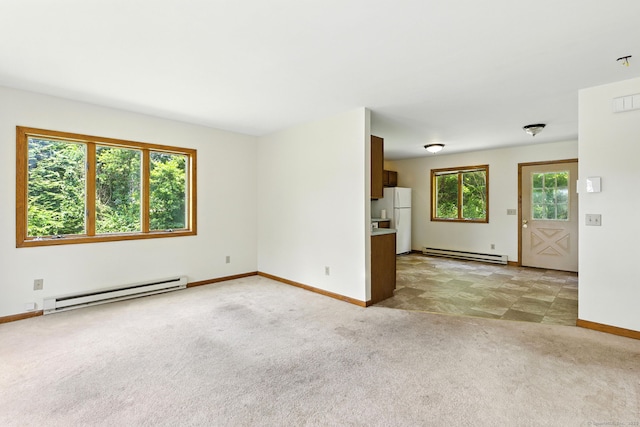40 Alma Ave, Wolcott, CT 06716 - unfurnished living room featuring a baseboard heating unit and light carpet
