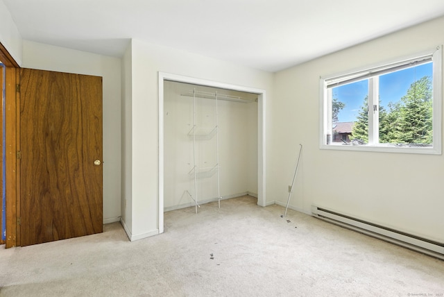 40 Alma Ave, Wolcott, CT 06716 - unfurnished bedroom featuring a baseboard heating unit, a closet, and carpet floors