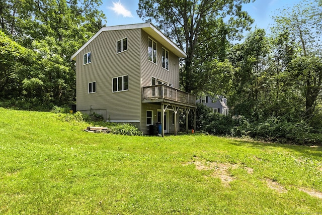 40 Alma Ave, Wolcott, CT 06716 - rear view of house with a wooden deck and a yard