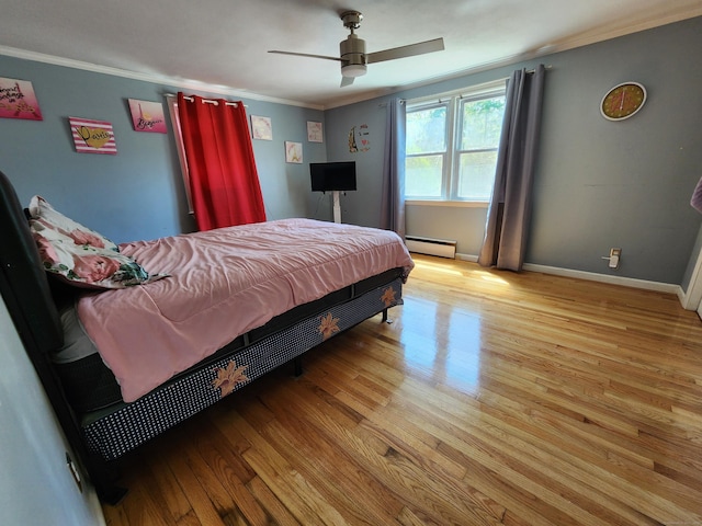1014 N Worthy St, Windsor, CT 06095 - bedroom featuring a baseboard heating unit, wood finished floors, crown molding, and a ceiling fan