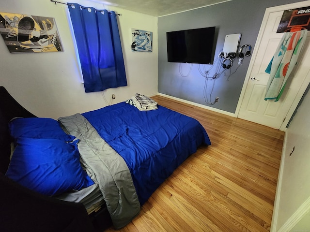 1014 N Worthy St, Windsor, CT 06095 - bedroom featuring wood finished floors and baseboards