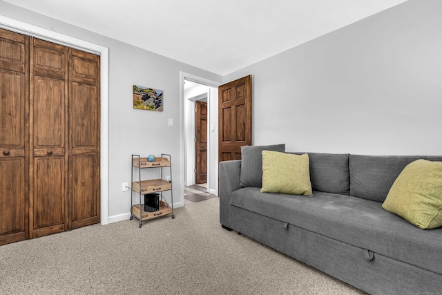 130 Irving St, Groton, CT 06355 - carpeted living area featuring baseboards