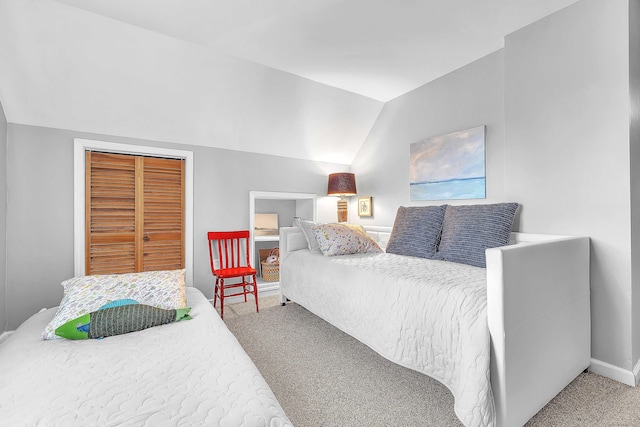 130 Irving St, Groton, CT 06355 - carpeted bedroom with vaulted ceiling and baseboards