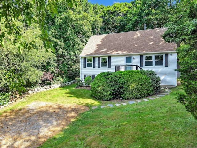 130 Irving St, Groton, CT 06355 - view of front of home featuring a front lawn and a shingled roof