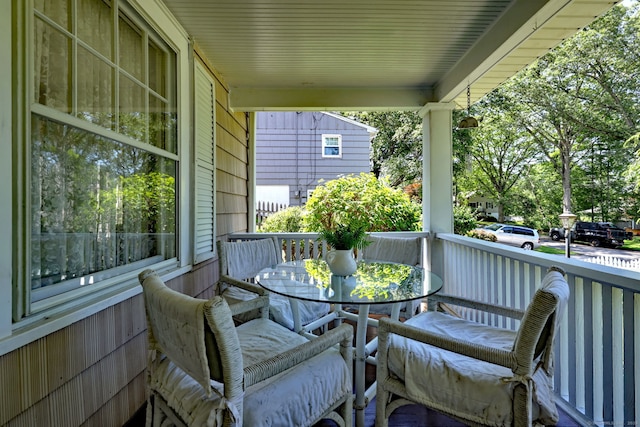 21 Oakwood Ave, Waterbury, CT 06708 - covered porch featuring outdoor dining space