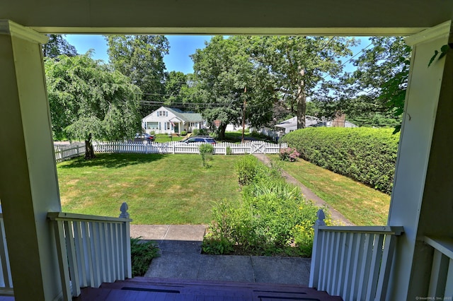 21 Oakwood Ave, Waterbury, CT 06708 - view of yard featuring a patio and view of wooded area