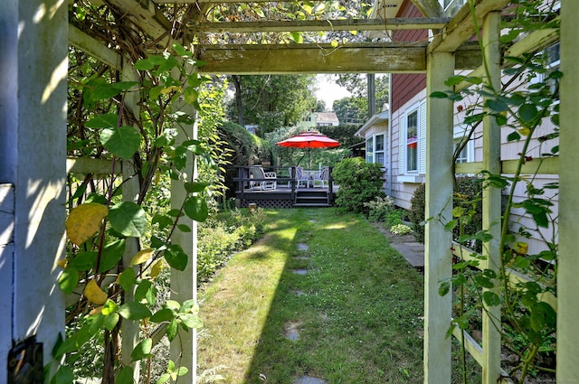 21 Oakwood Ave, Waterbury, CT 06708 - view of green lawn featuring a wooden deck and a pergola