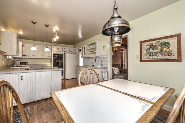 21 Oakwood Ave, Waterbury, CT 06708 - dining room featuring dark wood-style flooring