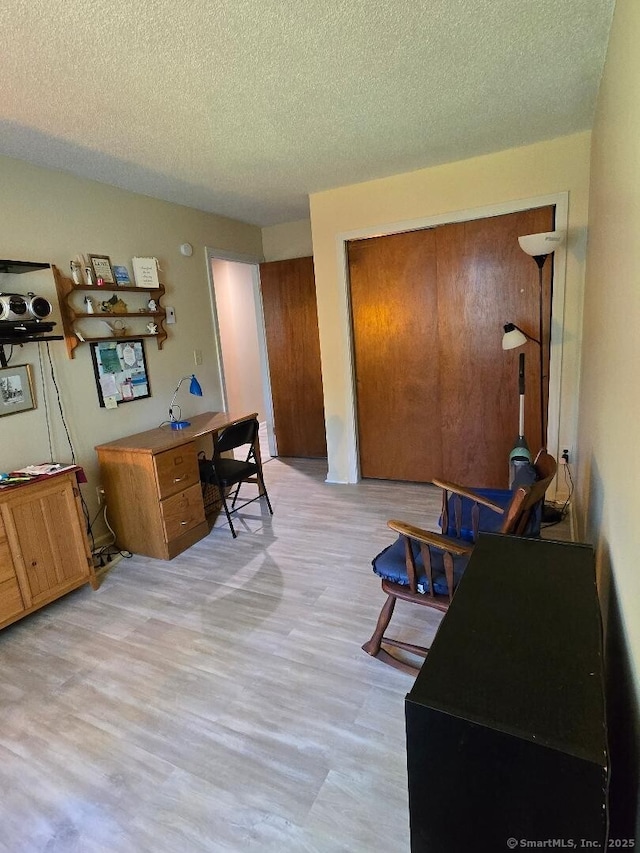 177 Lisle St Apt 5, Torrington, CT 06790 - office with a textured ceiling and light wood-style flooring