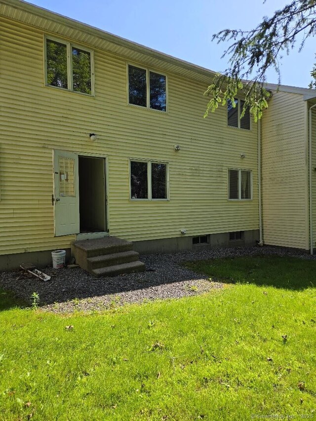 177 Lisle St Apt 5, Torrington, CT 06790 - back of house with a lawn