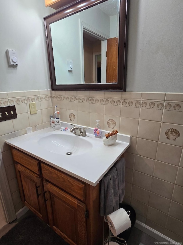 177 Lisle St Apt 5, Torrington, CT 06790 - bathroom with vanity, tile walls, and wainscoting