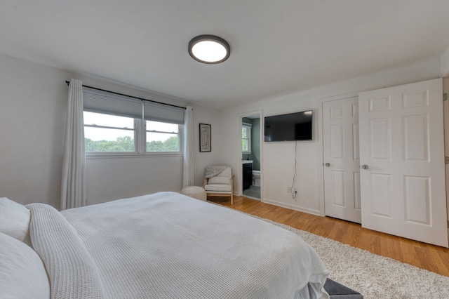 32 Patriot Ln, Newington, CT 06111 - bedroom featuring light wood-style flooring