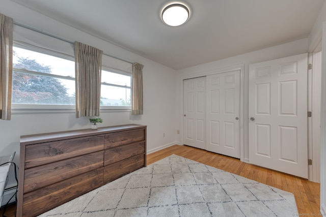 32 Patriot Ln, Newington, CT 06111 - bedroom featuring wood finished floors and a closet
