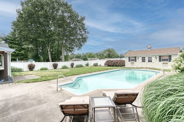 32 Patriot Ln, Newington, CT 06111 - view of pool featuring a fenced backyard, an outdoor structure, a patio, a storage structure, and a wooden deck