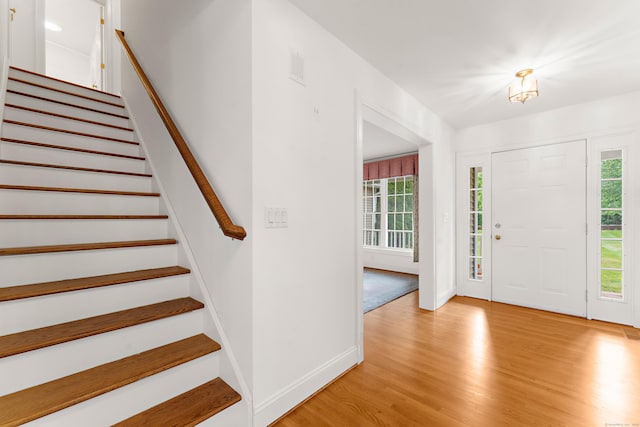 15 Sweet Meadow Dr, South Windsor, CT 06074 - entryway featuring light wood finished floors and stairs