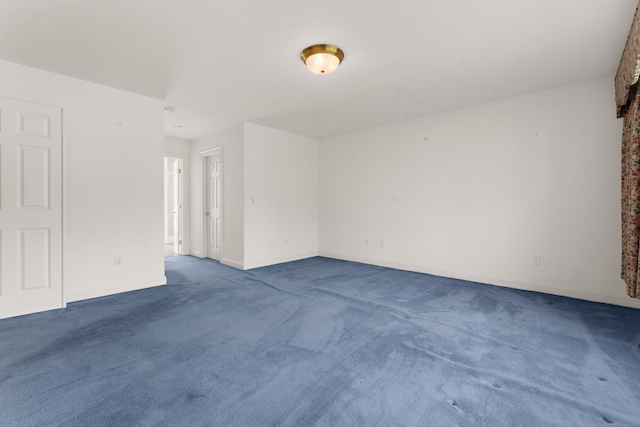 15 Sweet Meadow Dr, South Windsor, CT 06074 - spare room featuring dark colored carpet and baseboards