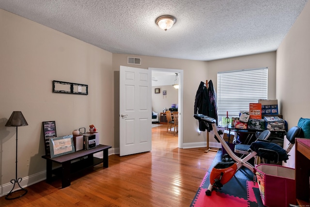 157 Carriage Crossing Ln Unit 157, Middletown, CT 06457 - home office with light wood-style flooring and a textured ceiling
