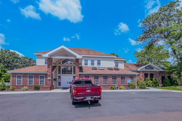 157 Carriage Crossing Ln Unit 157, Middletown, CT 06457 - view of front of house featuring brick siding and roof with shingles
