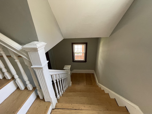 223 S Whitney St, Hartford, CT 06105 - staircase featuring wood finished floors and vaulted ceiling