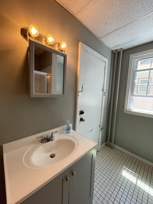 223 S Whitney St, Hartford, CT 06105 - full bath with vanity, tile patterned flooring, a shower, and a paneled ceiling