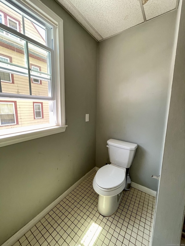 223 S Whitney St, Hartford, CT 06105 - bathroom featuring a paneled ceiling and tile patterned flooring