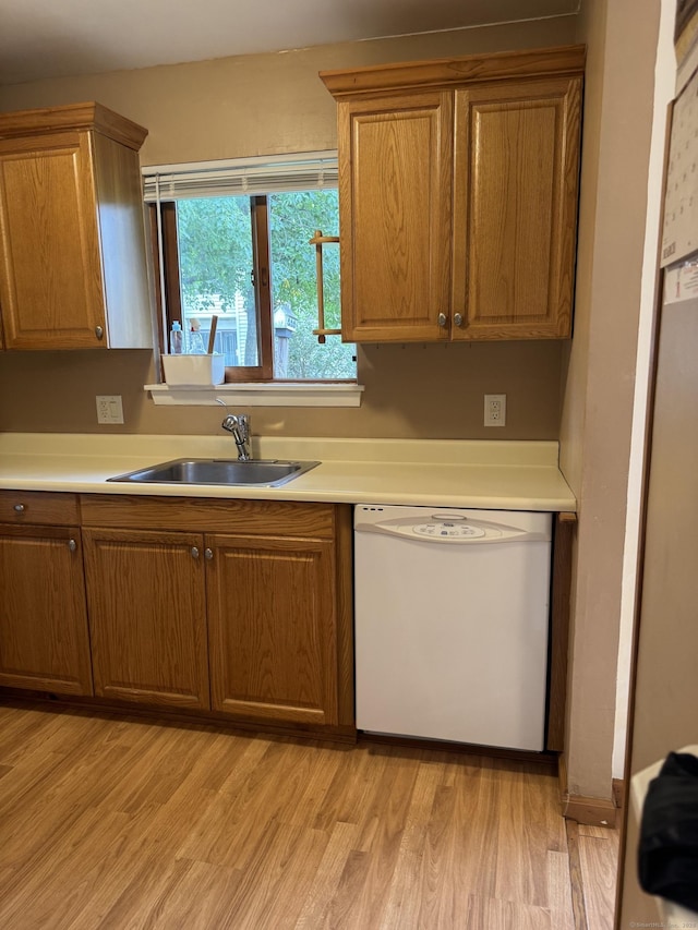 155 Cottonwood Rd Unit 155, Newington, CT 06051 - kitchen featuring dishwasher, brown cabinets, and light wood-style flooring