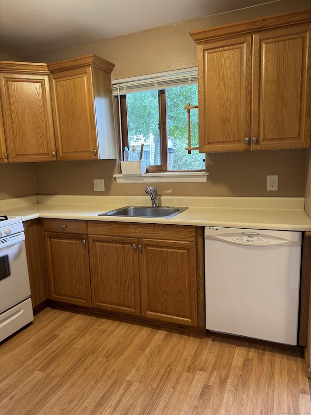 155 Cottonwood Rd Unit 155, Newington, CT 06051 - kitchen with white appliances, brown cabinets, and light wood-style flooring