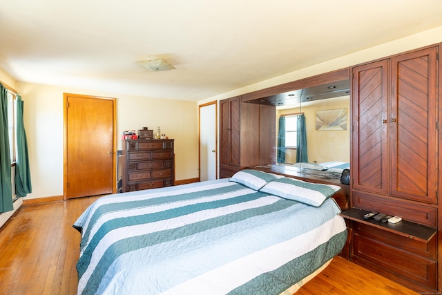 366 Hills St, East Hartford, CT 06118 - bedroom featuring light wood finished floors and baseboards