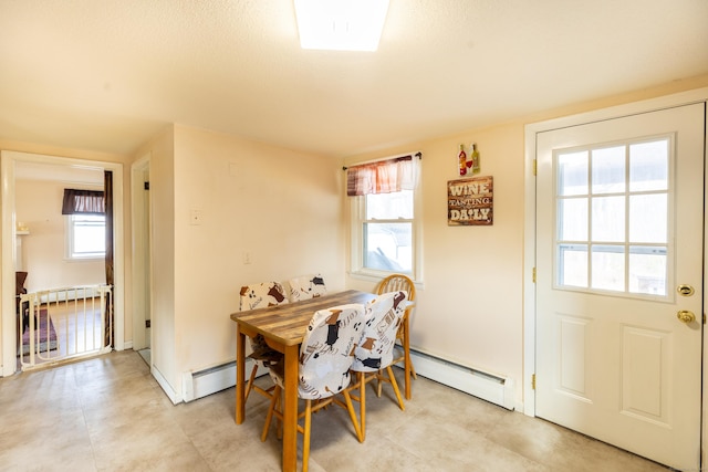 366 Hills St, East Hartford, CT 06118 - dining space with a baseboard heating unit and baseboard heating