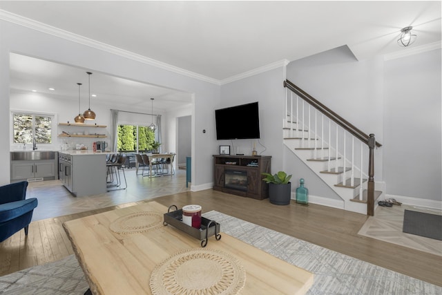 11 Regan Cir, Shelton, CT 06484 - living area featuring stairs, ornamental molding, light wood-type flooring, and recessed lighting