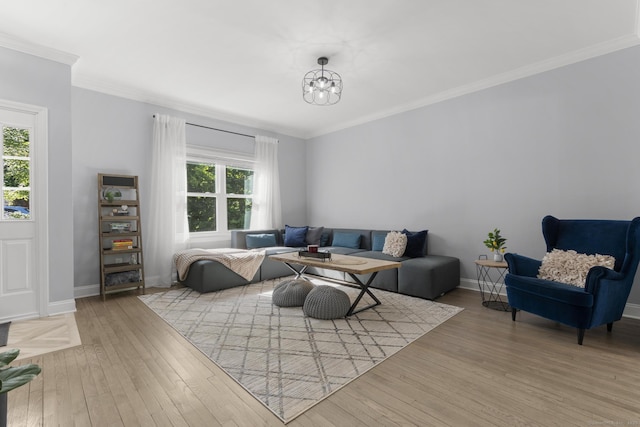 11 Regan Cir, Shelton, CT 06484 - living room with hardwood / wood-style flooring, a chandelier, and crown molding