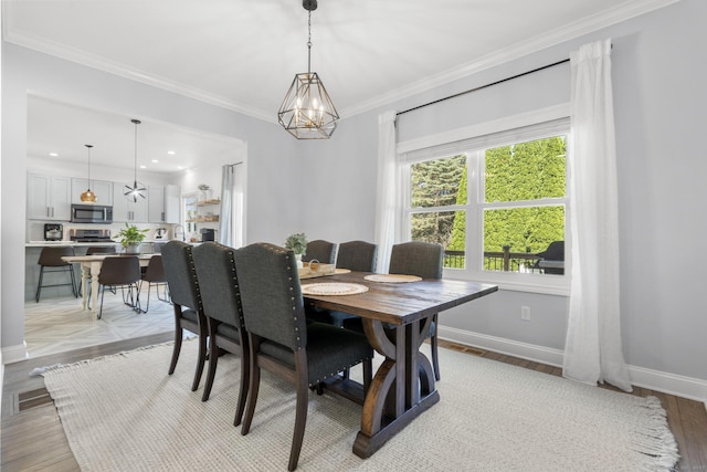 11 Regan Cir, Shelton, CT 06484 - dining space featuring ornamental molding and a chandelier