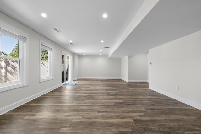 11 Regan Cir, Shelton, CT 06484 - unfurnished living room featuring recessed lighting and dark wood-style flooring