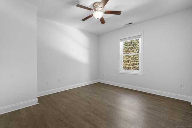 11 Regan Cir, Shelton, CT 06484 - unfurnished room with dark wood-type flooring and a ceiling fan