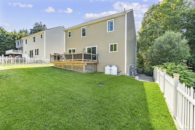 11 Regan Cir, Shelton, CT 06484 - back of house with a fenced backyard and a deck