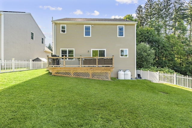 11 Regan Cir, Shelton, CT 06484 - rear view of house featuring a wooden deck and a fenced backyard