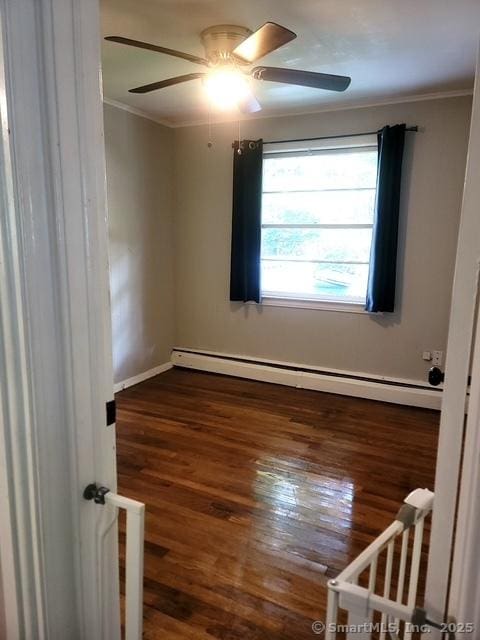 70 Ellsworth Dr, Bloomfield, CT 06002 - empty room featuring ornamental molding, a baseboard radiator, wood finished floors, and a ceiling fan