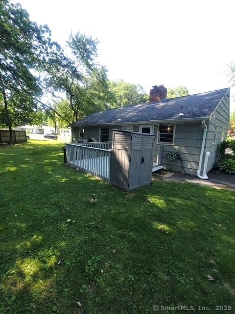 70 Ellsworth Dr, Bloomfield, CT 06002 - back of property featuring a chimney