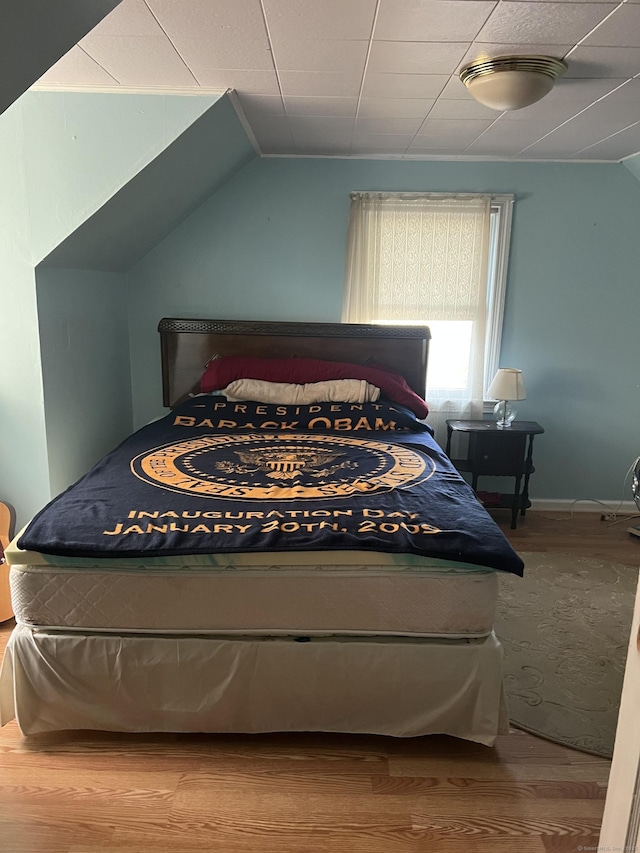 911 Matianuck Ave, Windsor, CT 06095 - bedroom with wood finished floors and lofted ceiling