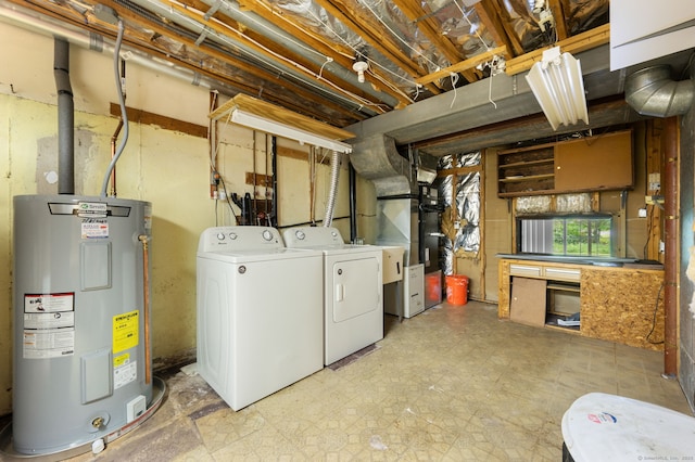 846 Long Hill Rd Unit 846, Middletown, CT 06457 - below grade area with electric water heater, independent washer and dryer, and tile patterned floors