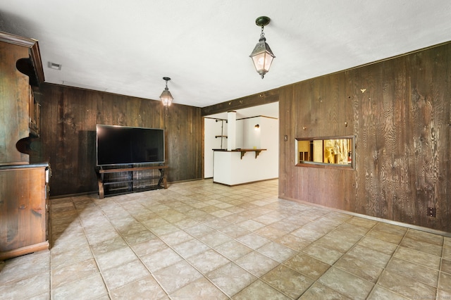 846 Long Hill Rd Unit 846, Middletown, CT 06457 - unfurnished living room with wood walls