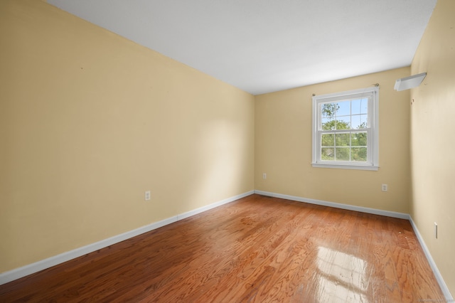 846 Long Hill Rd Unit 846, Middletown, CT 06457 - spare room featuring wood finished floors and baseboards